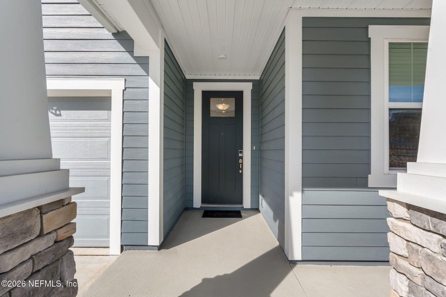 Exterior details and patio area of a home in Olde Mandarin Estates, Jacksonville (Image 27).