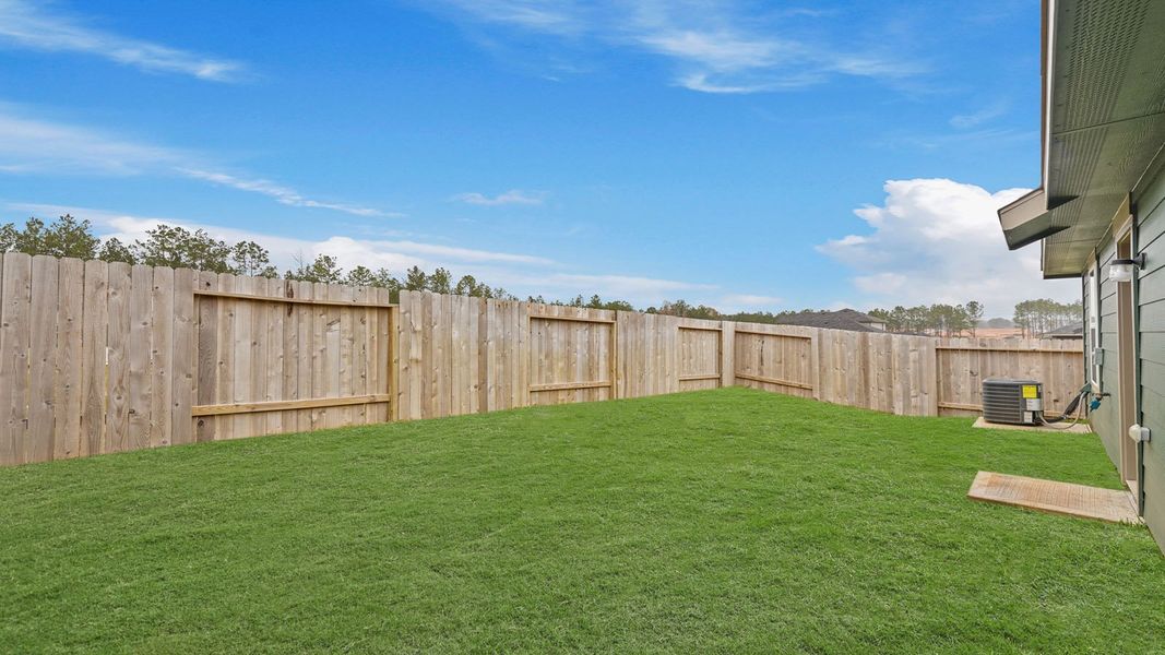 Exterior details and patio area of a home in McCrorey Trails, Conroe (Image 3).