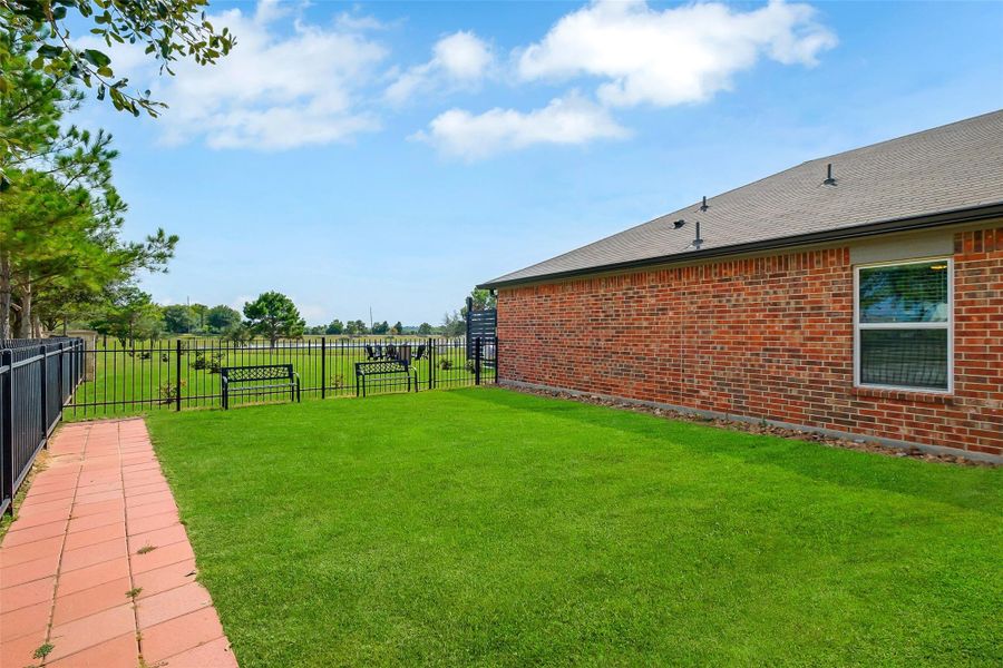 Exterior details and patio area of a home in Bauer Landing, Hockley (Image 1).