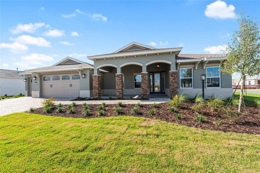 Front exterior of a new home in , Ocala, FL, highlighting curb appeal (Image 29). Front exterior of a new home in , Ocala, FL, highlighting curb appeal (Image 29).