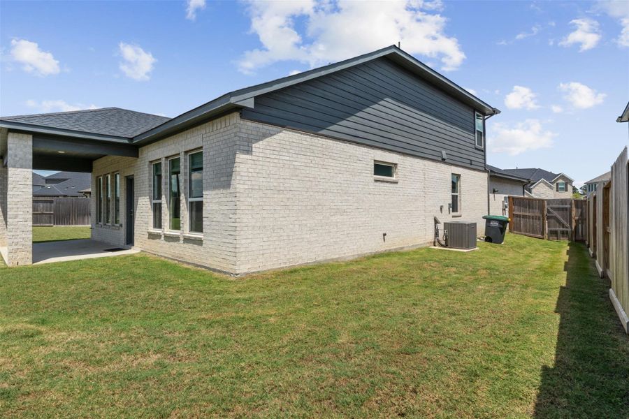 Front exterior of a new home in Raburn Reserve 50s, Tomball, TX, highlighting curb appeal (Image 25). Front exterior of a new home in Raburn Reserve 50s, Tomball, TX, highlighting curb appeal (Image 25).