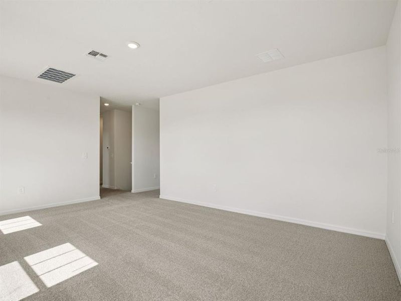 Spacious, unfurnished interior of a new home in Coasterra - Reserve Series, Palmetto (Image 35).