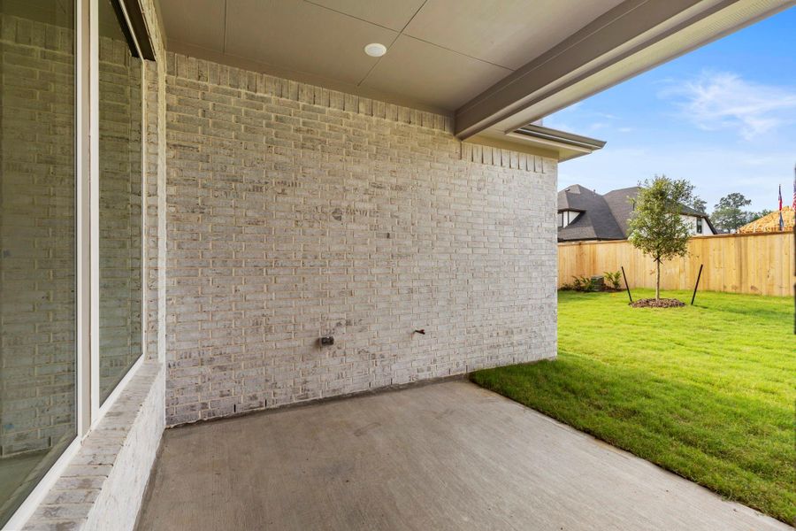 Exterior details and patio area of a home in , The Woodlands (Image 4).