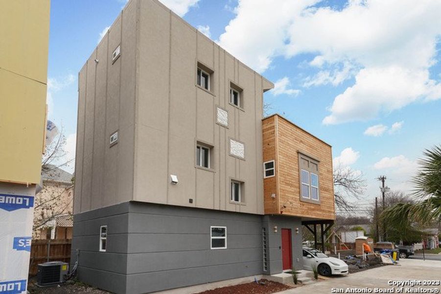 Front exterior of a new home in , San Antonio, TX, highlighting curb appeal (Image 2).