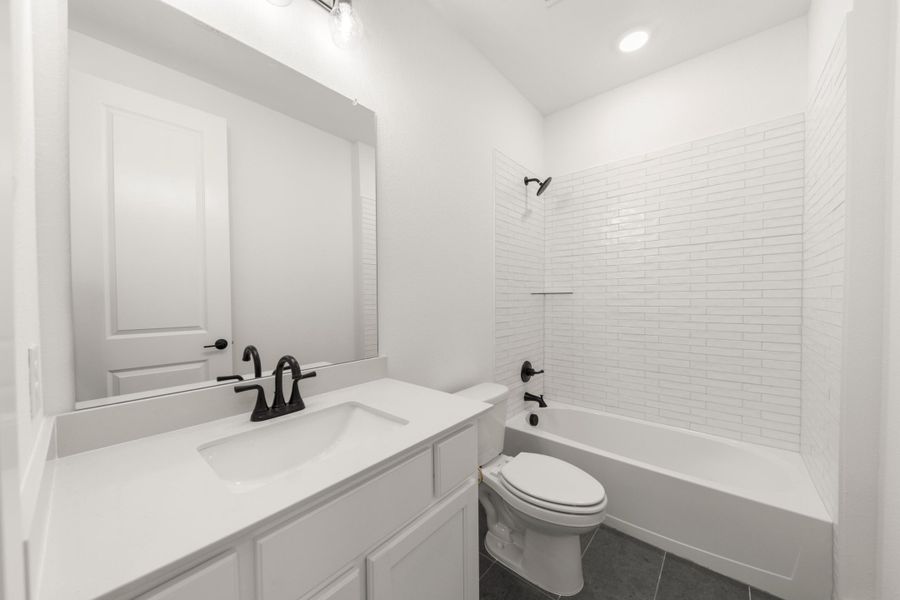 Furnished interior view inside a new home in Inspiration Collection at Union Park, Little Elm (Image 11).