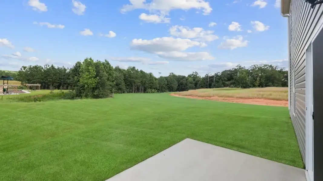 Exterior details and patio area of a home in Durbin Meadows, Fountain Inn (Image 21).