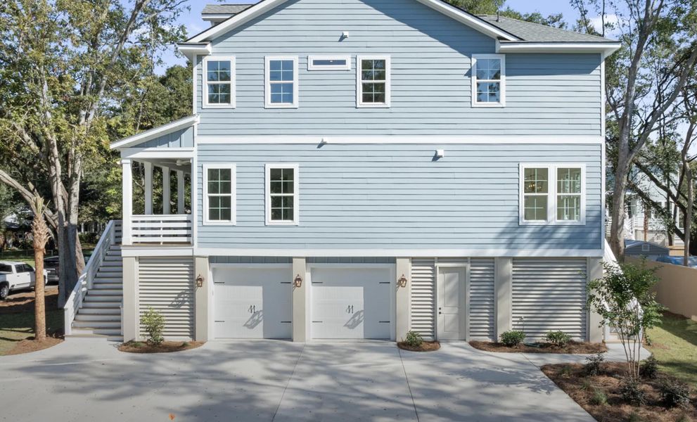 Front exterior of a new home in , Johns Island, SC, highlighting curb appeal (Image 15).