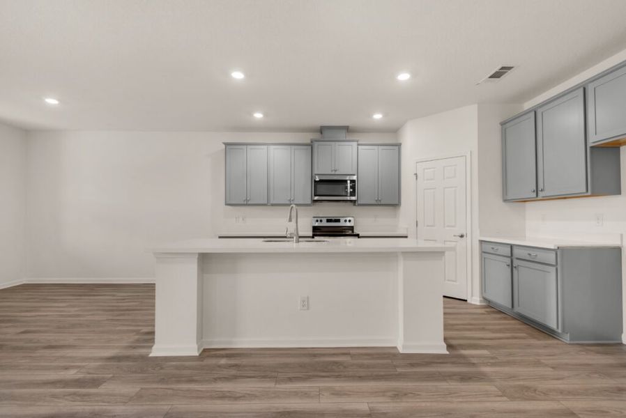 Representative furnished interior of a home built from the Osprey by Holiday Builders in Yellow River Ranch, Milton (Image 6). Representative furnished interior of a home built from the Osprey by Holiday Builders in Yellow River Ranch, Milton (Image 6).