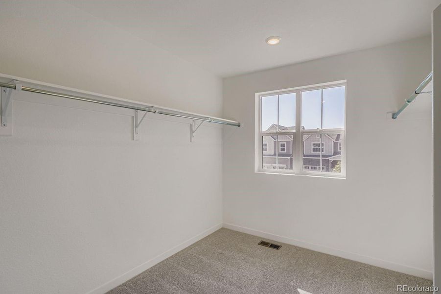 Spacious, unfurnished interior of a new home in Parterre: Paired Homes, Thornton (Image 11).