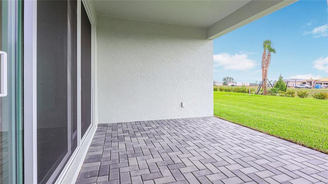 Exterior details and patio area of a home in Cresswind at Lake Harris, Tavares (Image 28). Exterior details and patio area of a home in Cresswind at Lake Harris, Tavares (Image 28).