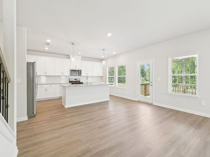 Spacious, unfurnished interior of a new home in Vines at Mill Creek - Estate Series, Braselton (Image 12).