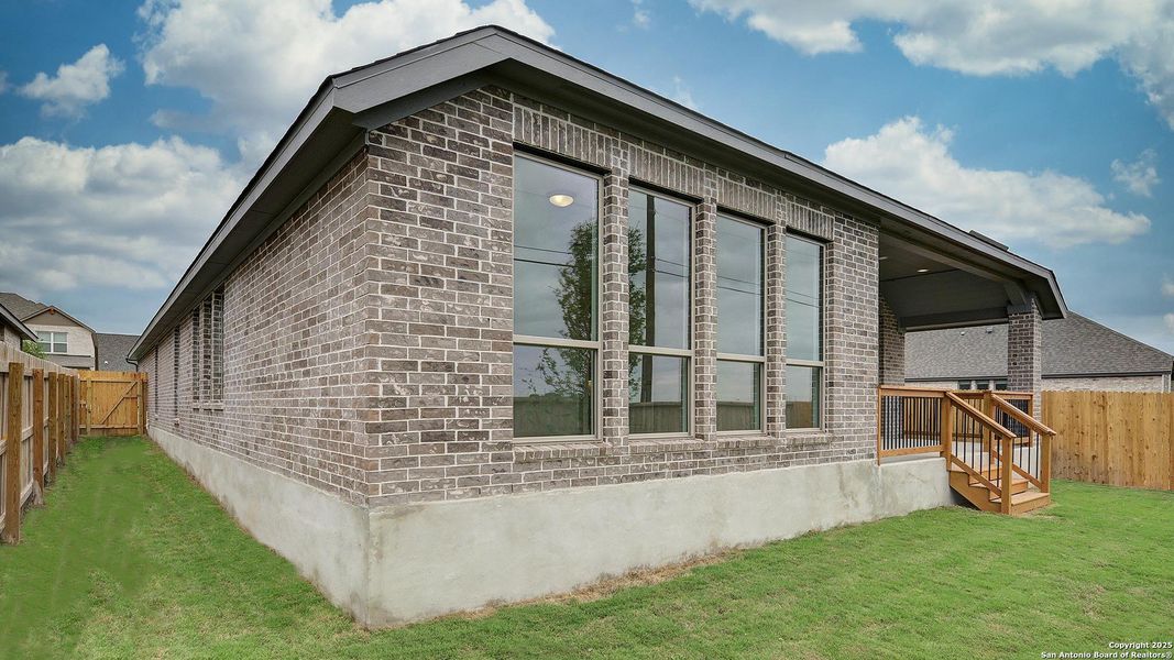 Exterior details and patio area of a home in Alsatian Oaks 50', Castroville (Image 20).