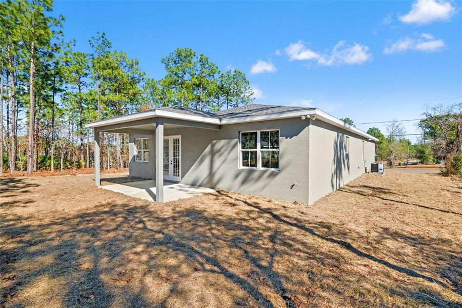 Exterior details and patio area of a home in , Citrus Springs (Image 4).