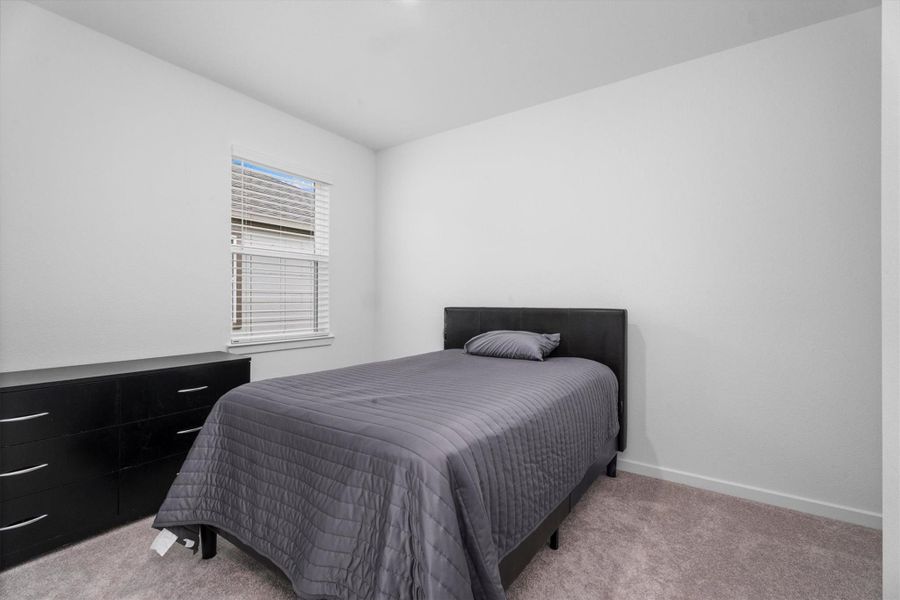 Furnished interior view inside a new home in Mason Woods, Cypress (Image 28).