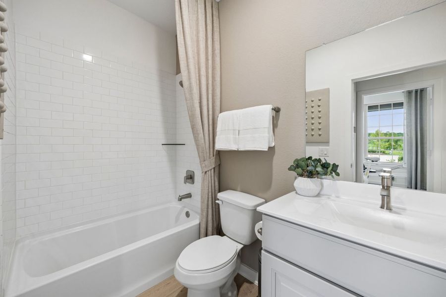 Representative furnished interior of a home built from the Riverdale by Pulte Homes in Mavera, Conroe (Image 6).