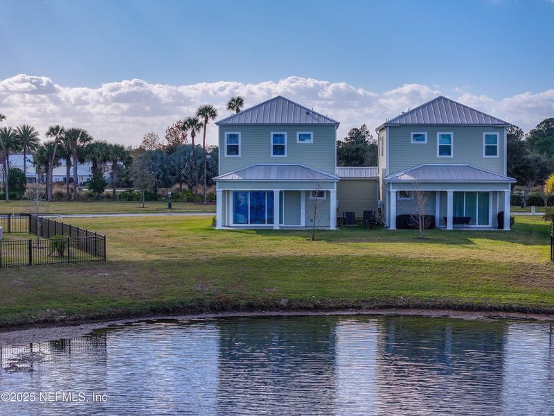 Front exterior of a new home in , St. Johns, FL, highlighting curb appeal (Image 27).