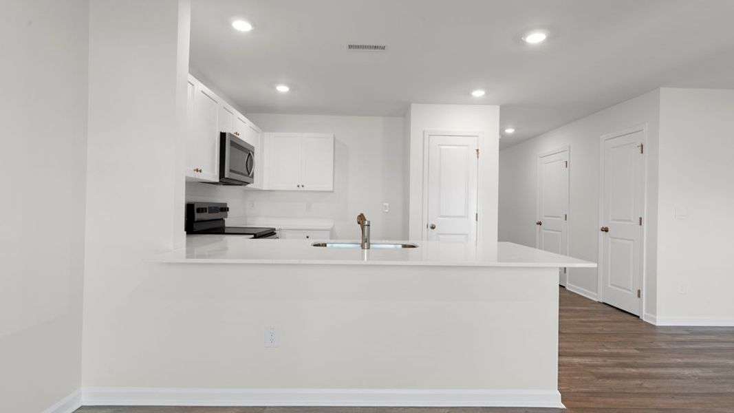 Furnished interior view inside a new home in The Townes at Belle Grove, Wendell (Image 5).