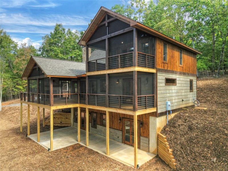 Front exterior of a new home in , Morganton, GA, highlighting curb appeal (Image 32).