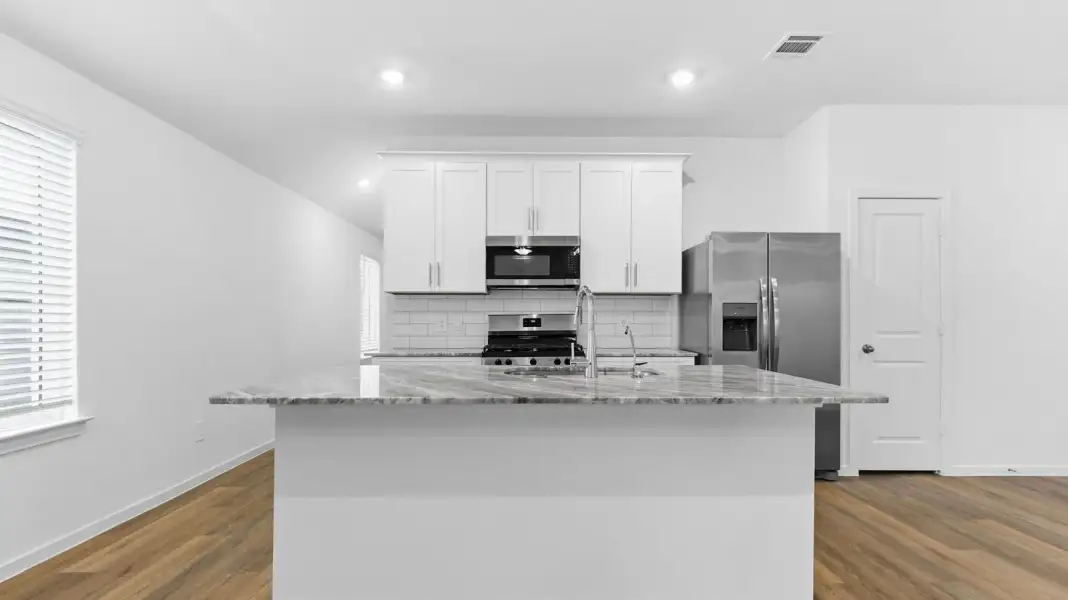Furnished interior view inside a new home in August Trails, Needville (Image 5).