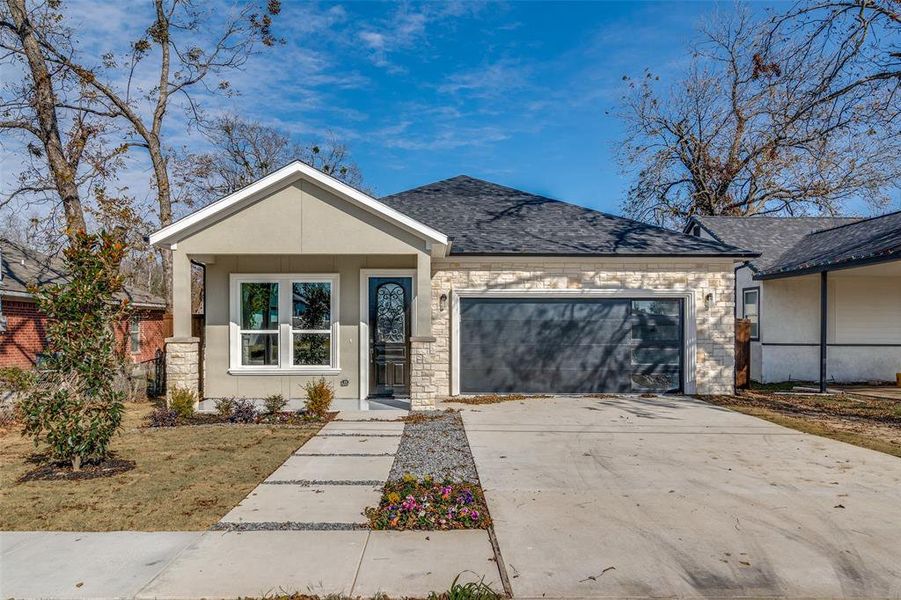 View of front of home with a garage