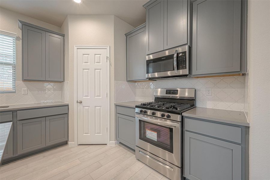 Furnished interior view inside a new home in , Iowa Colony (Image 6).