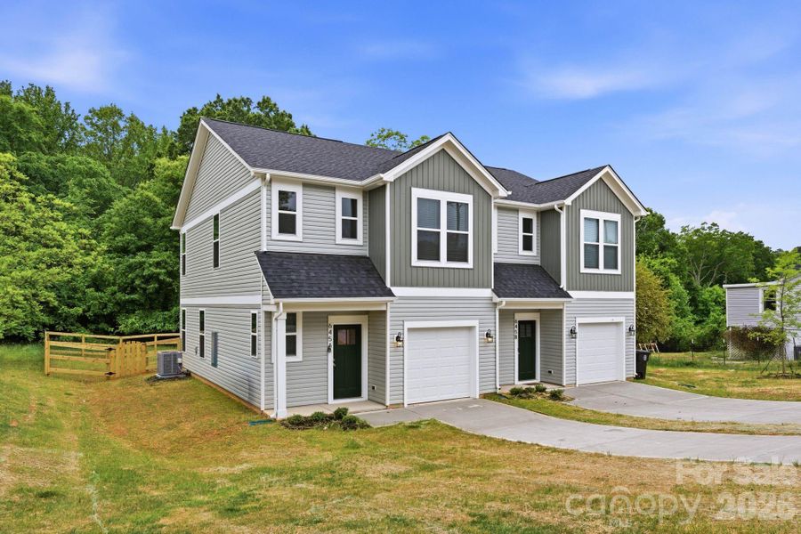 Front exterior of a new home in , Mooresville, NC, highlighting curb appeal (Image 18).