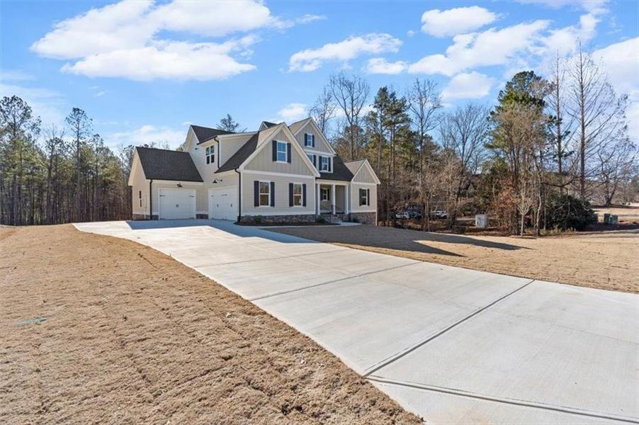 Front exterior of a new home in , Waleska, GA, highlighting curb appeal (Image 25).