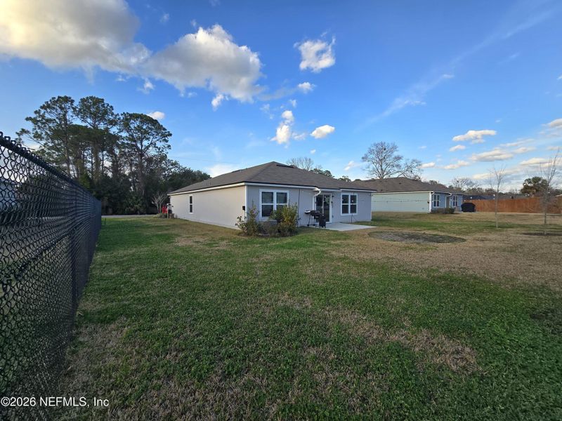 Exterior details and patio area of a home in Palm Coast Homesites, Palm Coast (Image 3).