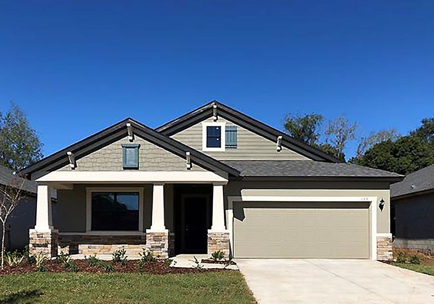 Representative exterior photo of a completed home built from the Sweetwater by William Ryan Homes in Myers Estates, Seffner, FL (Image 27).
