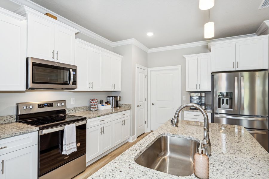 Representative furnished interior of a home built from the The Sapphire by Herbst Homes in Prosperity Point, Milton (Image 12).