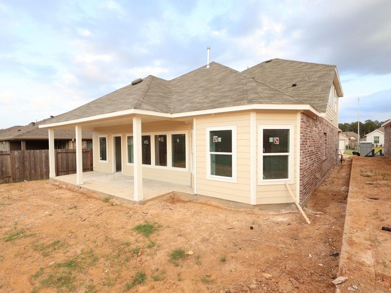Exterior details and patio area of a home in Magnolia Ridge, Magnolia (Image 4). Exterior details and patio area of a home in Magnolia Ridge, Magnolia (Image 4).