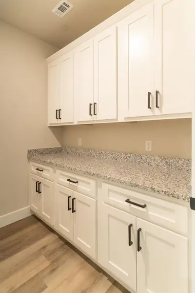 Furnished interior view inside a new home in , Smithville (Image 6).