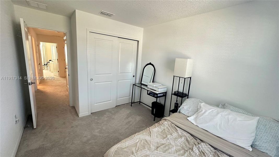 Furnished interior view inside a new home in The Townhomes at Bellalago, Kissimmee (Image 15).