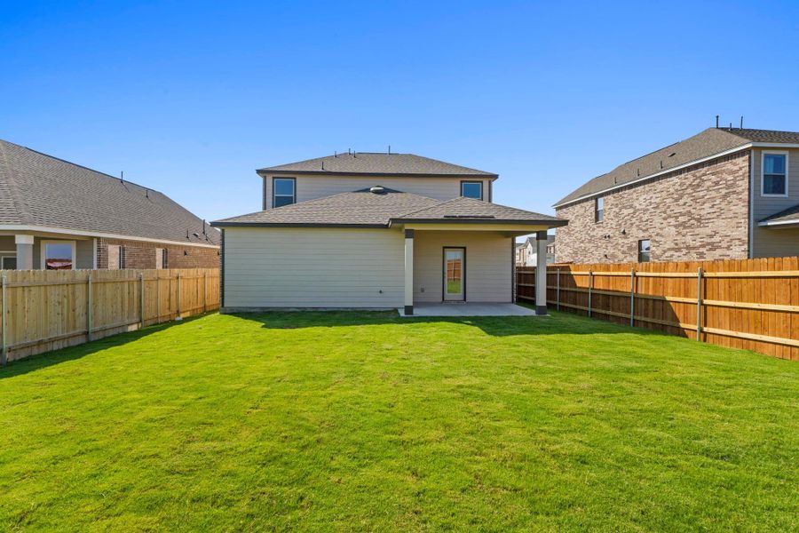Front exterior of a new home in Salerno - Heritage Collection, Round Rock, TX, highlighting curb appeal (Image 21). Front exterior of a new home in Salerno - Heritage Collection, Round Rock, TX, highlighting curb appeal (Image 21).