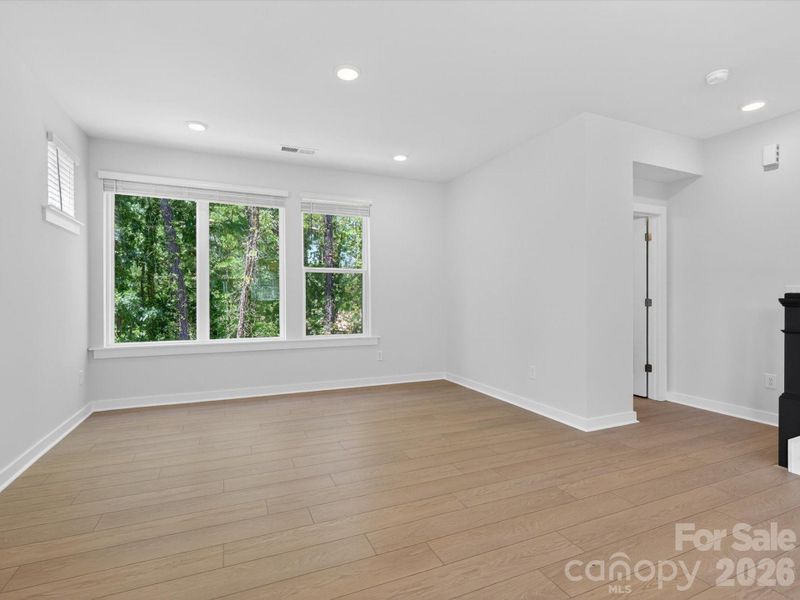 Spacious, unfurnished interior of a new home in Central Living at Craig, Charlotte (Image 22).