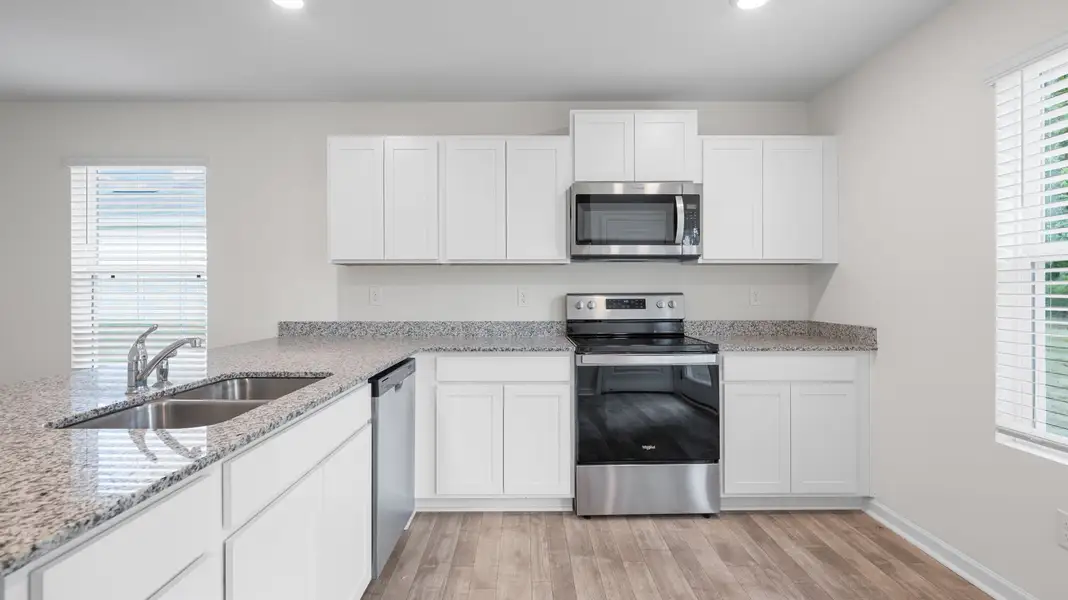 Representative furnished interior of a home built from the Lewis by D.R. Horton in Crescent Ridge, Niota (Image 4).
