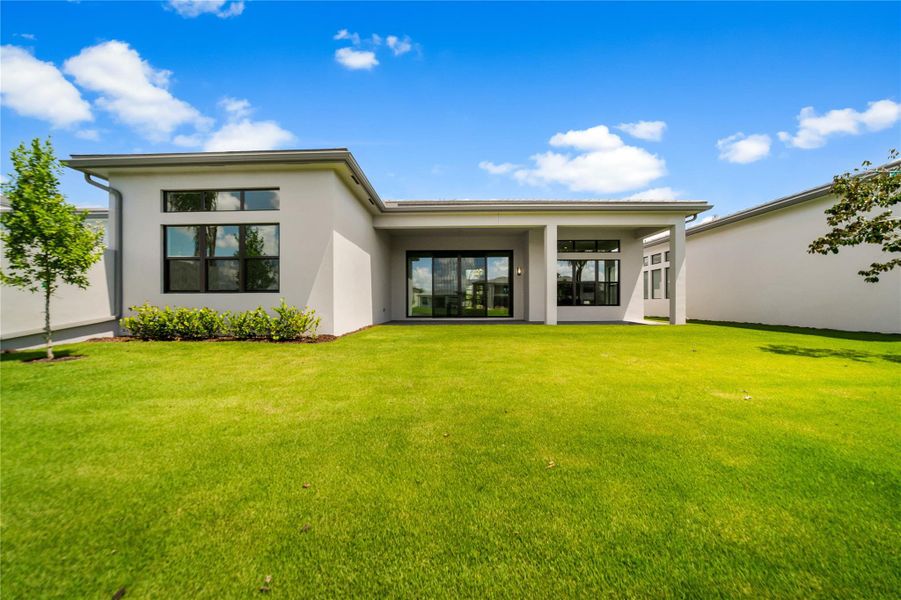 Front exterior of a new home in , Boca Raton, FL, highlighting curb appeal (Image 38). Front exterior of a new home in , Boca Raton, FL, highlighting curb appeal (Image 38).
