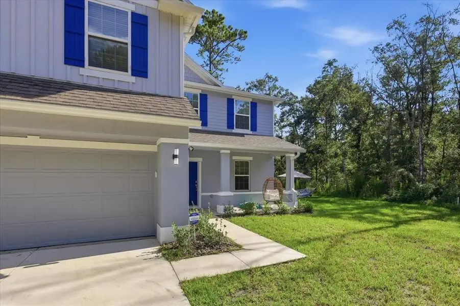 Exterior details and patio area of a home in Flagler Estates, Hastings (Image 4).