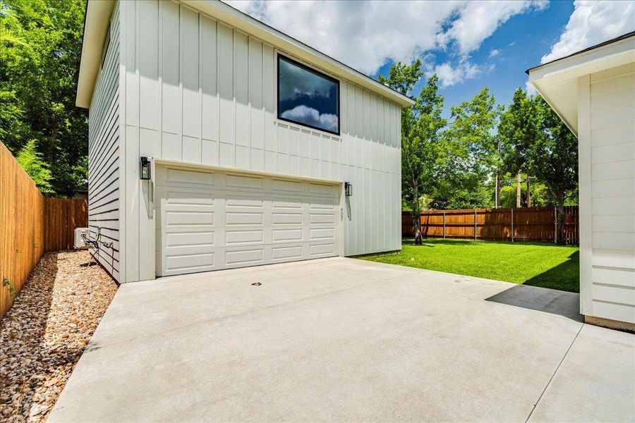 Detached garage with the guest home on the second floor. Detached garage with the guest home on the second floor.