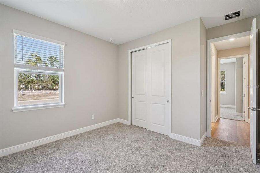 Spacious, unfurnished interior of a new home in Legends Preserve - Signature Series, Daytona Beach (Image 25). Spacious, unfurnished interior of a new home in Legends Preserve - Signature Series, Daytona Beach (Image 25).