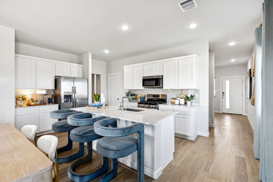 Kitchen in a Nicholson Ranch Magnolia Model Home in Lavon TX by Trophy Signature Homes