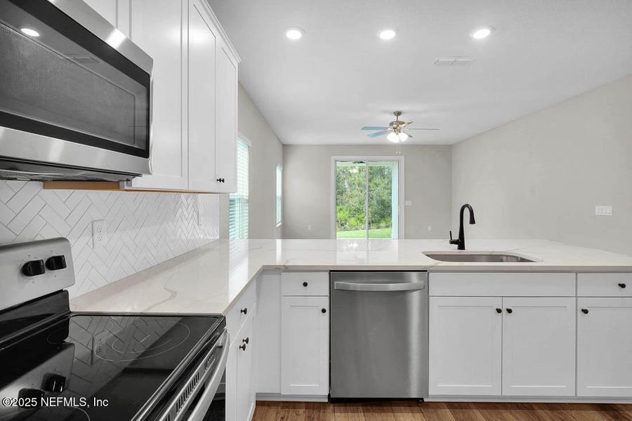Furnished interior view inside a new home in , Jacksonville (Image 6).