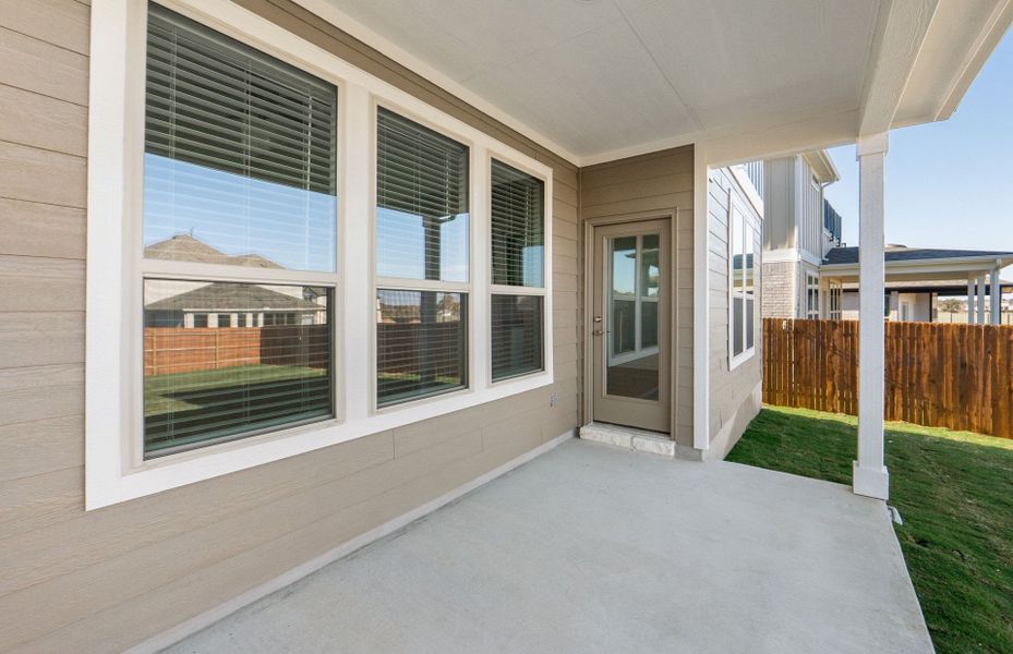 Exterior details and patio area of a home in Santa Rita Ranch, Liberty Hill (Image 25).