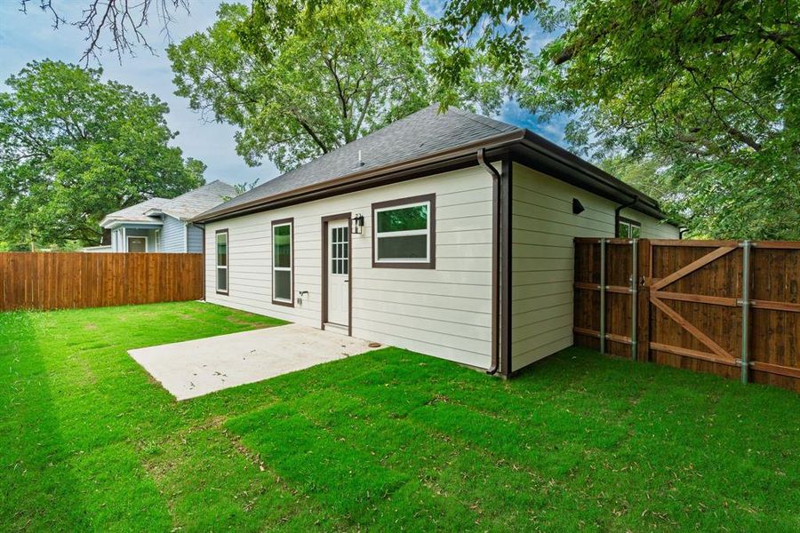 Front exterior of a new home in , Greenville, TX, highlighting curb appeal (Image 1). Front exterior of a new home in , Greenville, TX, highlighting curb appeal (Image 1).