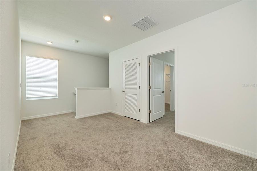 Spacious, unfurnished interior of a new home in Westgate at Avalon Park, Wesley Chapel (Image 21).