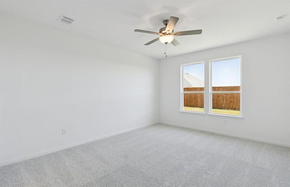 Spacious owner's suite with large windows