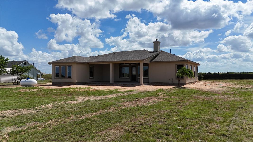 Exterior details and patio area of a home in , Bertram (Image 25).