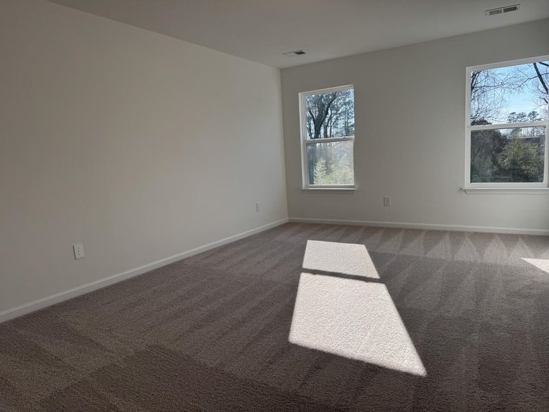 Spacious, unfurnished interior of a new home in East Main Townes, Spartanburg (Image 19).