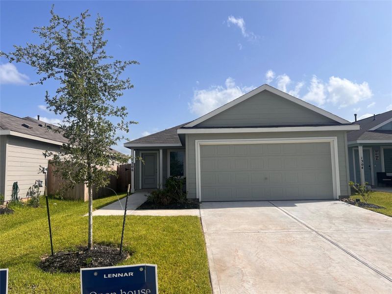 Front exterior of a new home in Wharton Lakes, Wharton, TX, highlighting curb appeal (Image 2). Front exterior of a new home in Wharton Lakes, Wharton, TX, highlighting curb appeal (Image 2).