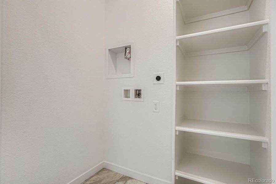 Spacious, unfurnished interior of a new home in Parterre: The Parkside Collection, Thornton (Image 8).